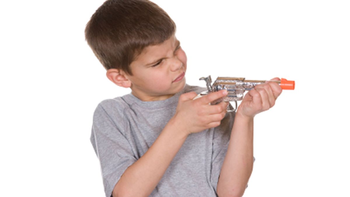 little boy with gun