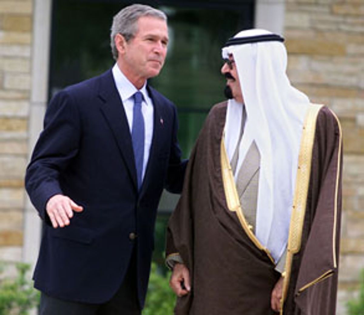 404474 02:  U.S. President George W. Bush (L) and Saudi Crown Prince Abdullah stand in front of Bush's home before a meeting April 25, 2002 in Crawford, TX. The leaders are seeking a solution to the Israeli-Palestinian conflict that is fueling growing tensions between the Arab world and the U.S. (Photo by Rod Aydelotte-Pool/Getty Images) (Getty Images)