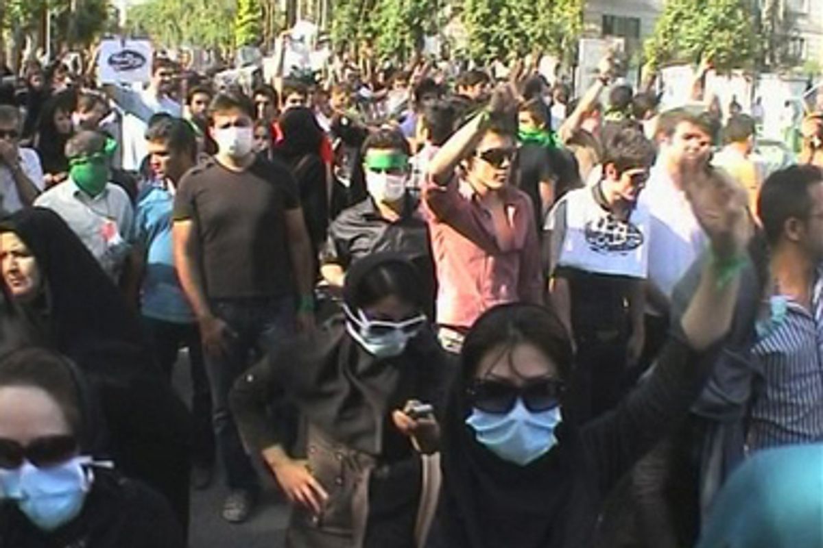 In this frame grab taken from amateur video, supporters of Iranian reformist opposition leader Mir Hossien Mousavi demonstrate in Tehran, Iran, Tuesday June 16, 2009. Thousands of protesters rallied in Tehran in support of Mousavi, according to witnesses and video footage.