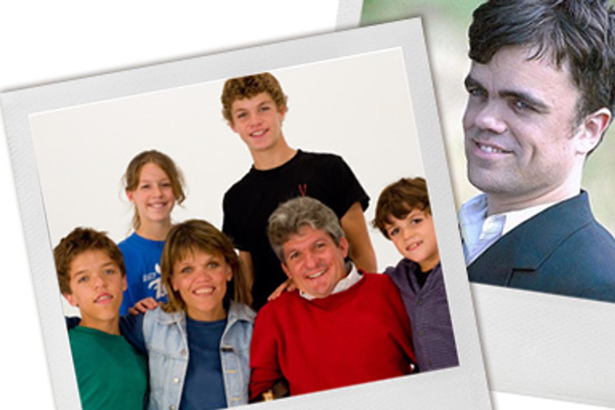 Matt and Amy Roloff with their children Molly and Jeremy (back row), Zack and Jacob (front row), and Peter Dinklage in "The Station Agent"