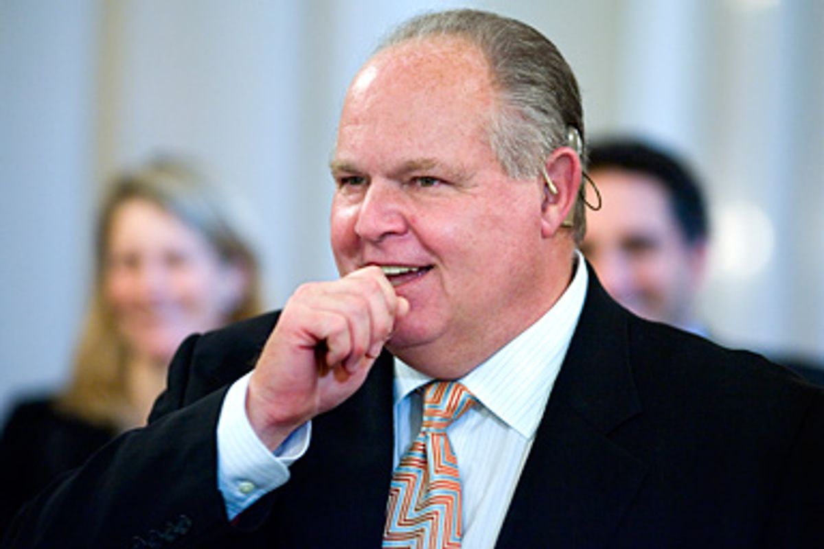 Conservative talk radio host Rush Limbaugh attends a ceremony in the East Room of the White House in Washington, Tuesday, Jan. 13, 2009. President Bush was presenting the Presidential Medal of Freedom to Colombian President Alvaro Uribe, former British Prime Minister Tony Blair and former Australian Prime Minister John Howard. Limbaugh, who suffered hearing loss as a result of autoimmune inner ear disease, wears a cochlear implant, a powerful hearing aid that is implanted in the inner ear of an individual with nerve deafness. 