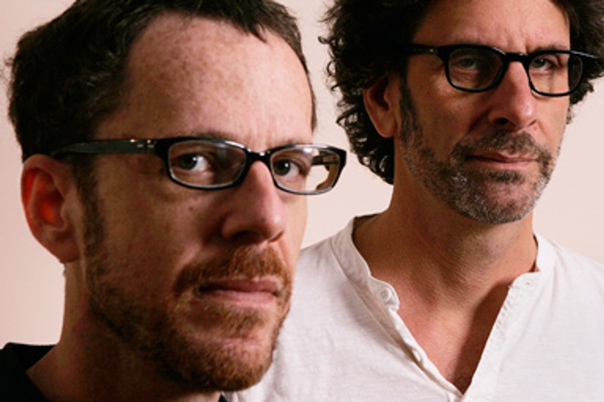 Directors Ethan Coen, left, and Joel Coen pose for a portrait at the 34th Toronto International Film Festival in Toronto, Sunday, Sept. 13, 2009. 