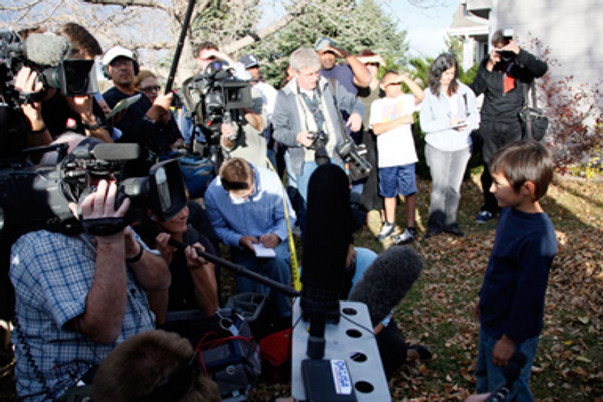 Six-year-old Falcon Heene is surrounded by reporters on the lawn of his house in Fort Collins, Colorado October 15, 2009.  
