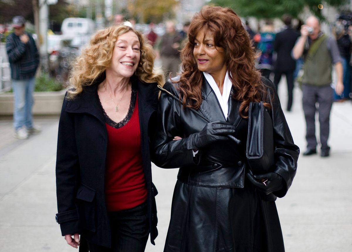 Dominatrix Terri-Jean Bedford, right, carries a riding crop while walking with sex workers advocate Valerie Scott in front of Ontario Superior Court in Toronto on Tuesday, Oct. 6, 2009. The Toronto dominatrix and two other sex workers launched a constitutional challenge to Canada's prostitution laws. (AP Photo/The Canadian Press, Darren Calabrese) (Associated Press)