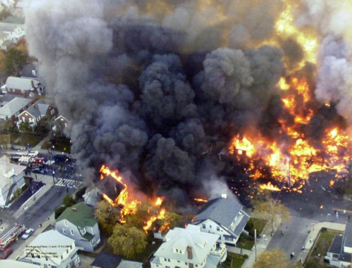Fires burning in New York's Belle Harbor neighborhood, from the crash of American Airlines Flight 587 which killed 265 people, are visible from a police helicopter Monday, Nov. 12, 2001. (AP Photo/New York Police Department)  (Associated Press)