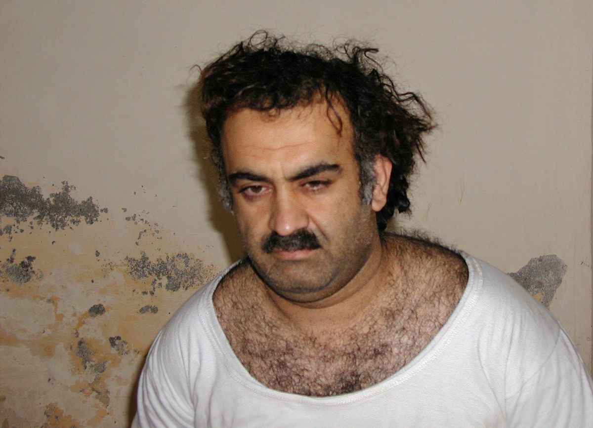 ** FILE ** Khalid Sheikh Mohammed, the alleged Sept. 11 mastermind, is seen shortly after his capture during a raid in Pakistan in this file photo from March 1, 2003 in this photo obtained by the Associated Press. Mohammed, who could face the death penalty for his role in the Sept. 11 attacks, has been peppering his military lawyer with questions in advance of his war crimes trial at Guantanamo, the attorney tells The Associated Press. (AP Photo-File)   (Associated Press)