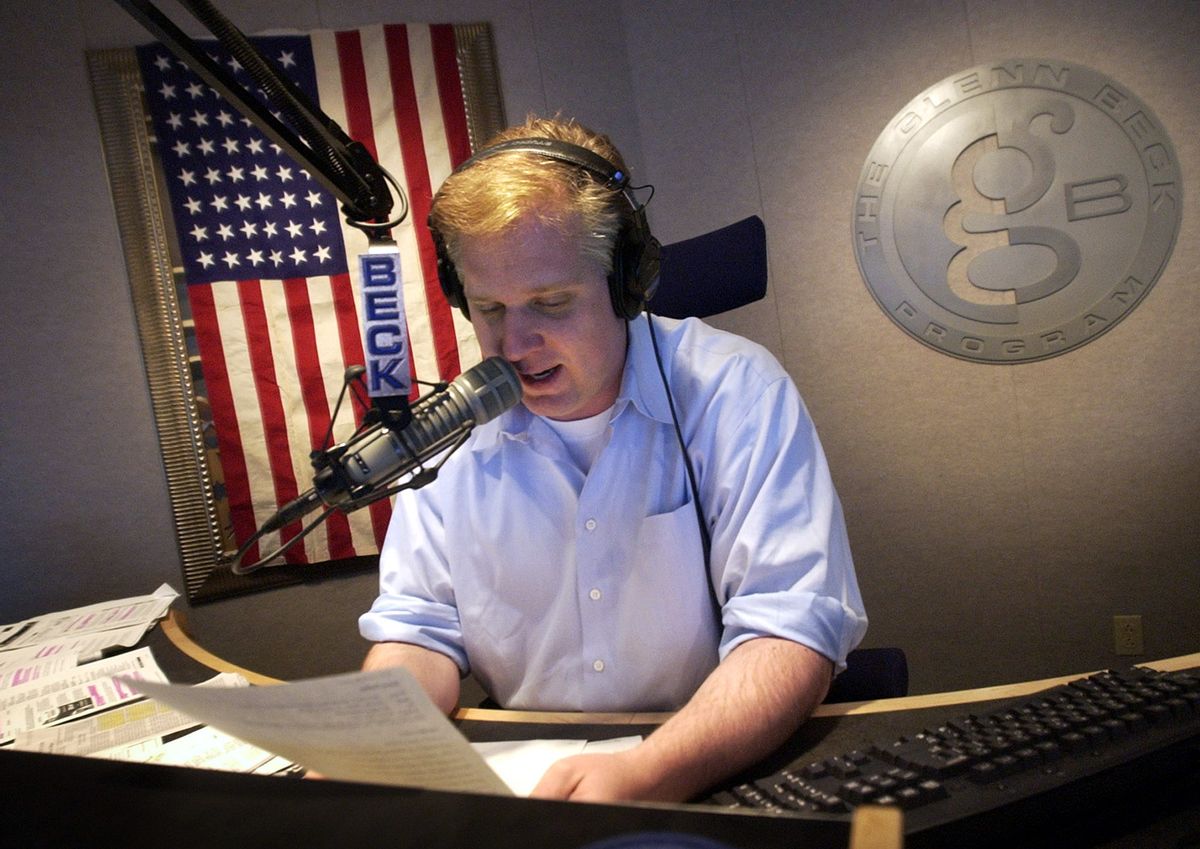 Syndicated radio host Glenn Beck, whose Philadelphia-based show is heard in more than 100 markets, is seen recording promotional annoucements for an upcoming "Rally for America" in his Bala Cynwyd, Pa. studio Wednesday, March 12, 2003. A series of flag-draped pro-military gatherings, organized by Beck, are drawing thousands of people to demonstrate support for U.S. troops oversees. (AP Photo/Mike Mergen) (Associated Press)