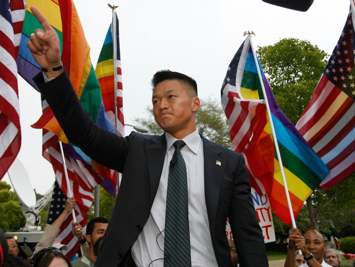 Former US Army Lt. Dan Choi, the first Arabic-speaking specialist dismissed through the 'Don't Ask, Don't Tell' policy under the Obama Administration comments on Prop 8, outside the Beverly Hills hotel, where US president Barack Obama attended a benefit dinner in Beverly Hills, Calif. on Wednesday, May 27, 2009. (AP Photo/Damian Dovarganes) (Damian Dovarganes)