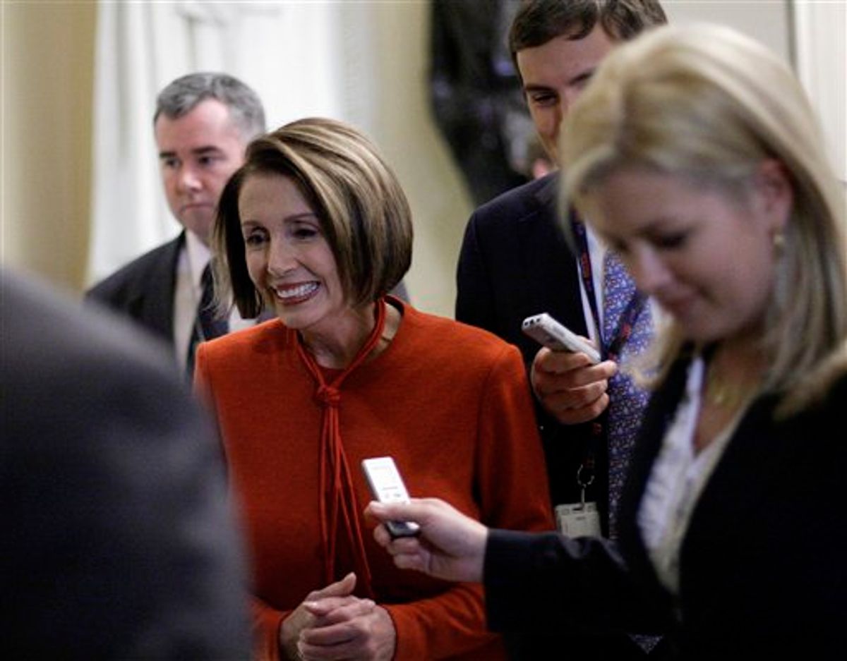 Speaker Nancy Pelosi is surrounded as she walks to the floor of the House of Representatives for the continuing health care debate at the U.S. Capitol, Saturday, Nov. 7, 2009 in Washington. (AP Photo/Alex Brandon) (Associated Press)