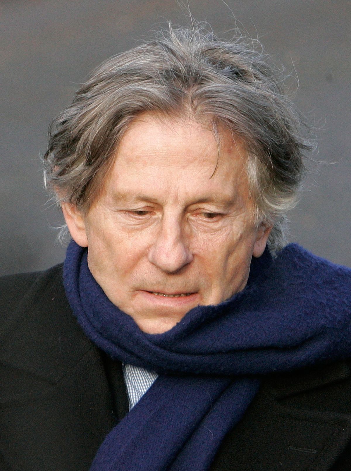 ** FILE ** Polish-born film director Roman Polanski during the burial ceremony for French film maker Claude Berri in Montrouge, outside Paris, in this Jan. 15, 2009 file photo. Organizers of the Zurich Film Festival say director Roman Polanski has been taken into custody on a 31-year-old U.S. arrest warrant. The organizers say Polanski was detained by police Saturday Sept. 26, 2009.   (AP Photo/Michel Euler, File) (Michel Euler)