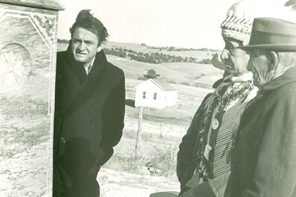 Johnny Cash touring Wounded Knee with the descendants of those who survived the 1890 massacre in December of 1968.    