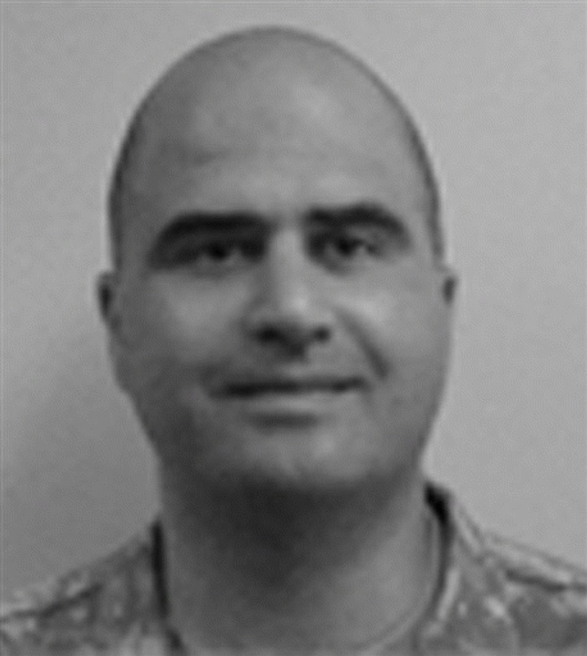 This photo from the Center for the Study of Traumatic Stress Web Site shows Nidal Malik Hasan.  