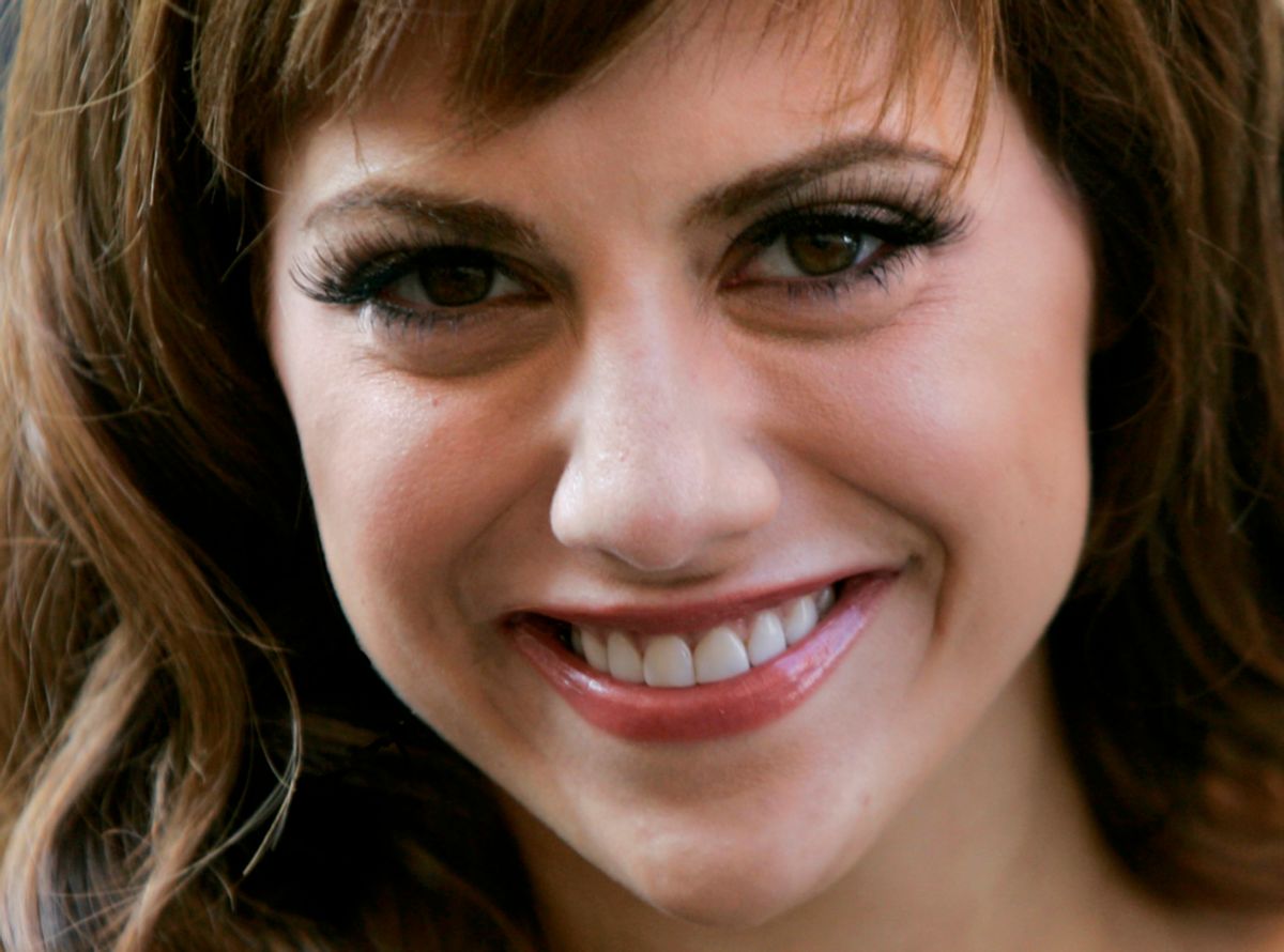 U.S. actress Brittany Murphy arrives to launch the summer sale of the Harrods department store in central London, Monday, June 27, 2005.  Harrods Chairman, Mohamed Al Fayed on Monday took Murphy on a tour of the store's best bargains.  (AP Photo/Matt Dunham) (Matt Dunham)