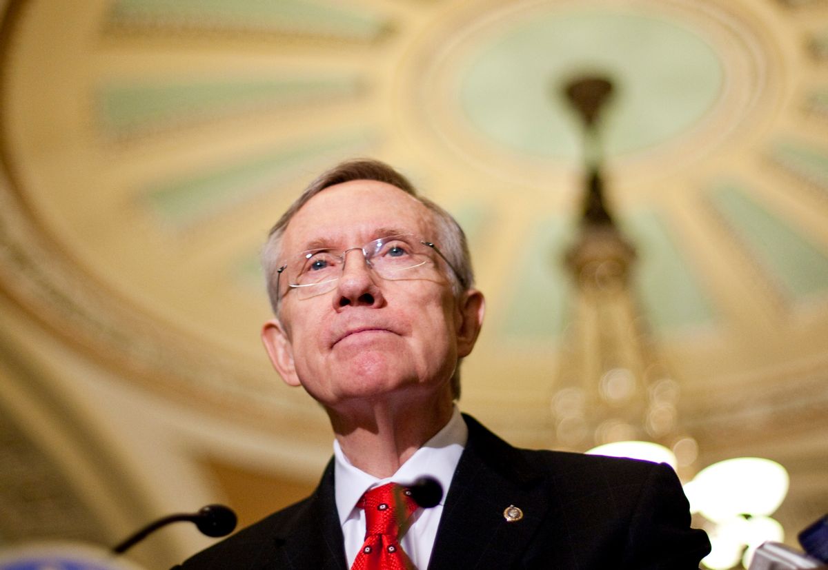 Senate Majority Leader Harry Reid talks to the media after the Senate Democratic caucus that President Barack Obama attended on Capitol Hill in Washington Sunday, Dec. 6, 2009. (AP Photo/Alex Brandon) (Associated Press)