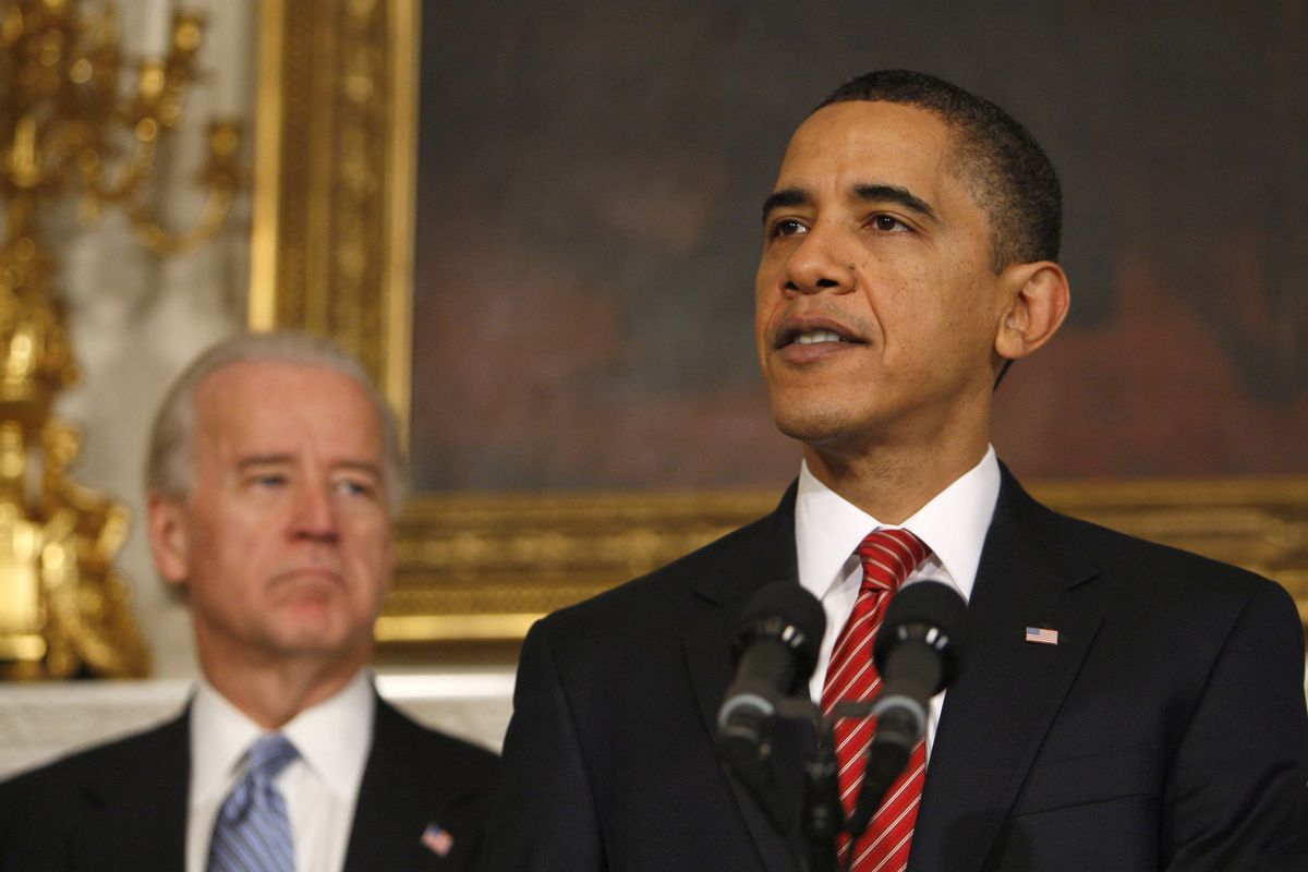 President Barack Obama, accompanied by Vice President Joe Biden, speaks in the State Dining Room of the White House in Washington, Thursday, Dec. 24, 2009, after the  Senate passed the health care reform bill. (AP Photo/Charles Dharapak) (Associated Press)