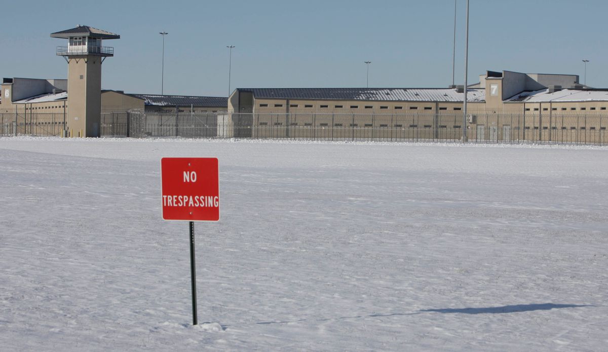 A No Trespassing sign stands in the snow outside the Thomson Correctional Center, Tuesday, Dec. 15, 2009, in Thomson, Ill. President Barack Obama today ordered the federal government to acquire the state prison in Thomson to be the new home for a limited number of terror suspects now held at the U.S. detention facility at Guantanamo Bay, Cuba. The federal government will acquire Thomson Correctional Center, transforming the prison in a sleepy town near the Mississippi River into a prison that exceeds supermax standards. (AP Photo/(M. Spencer Green) (M. Spencer Green)
