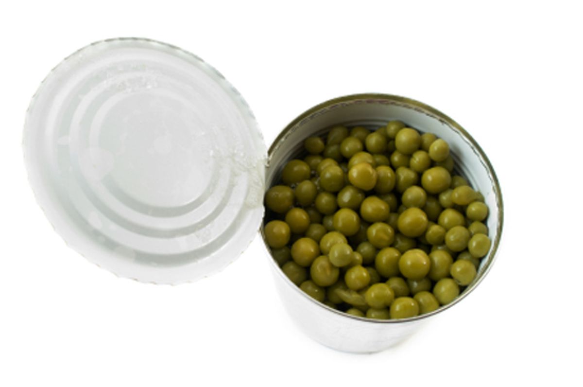 Canned green peas isolated on white background. (Jovan V. Nikolic)