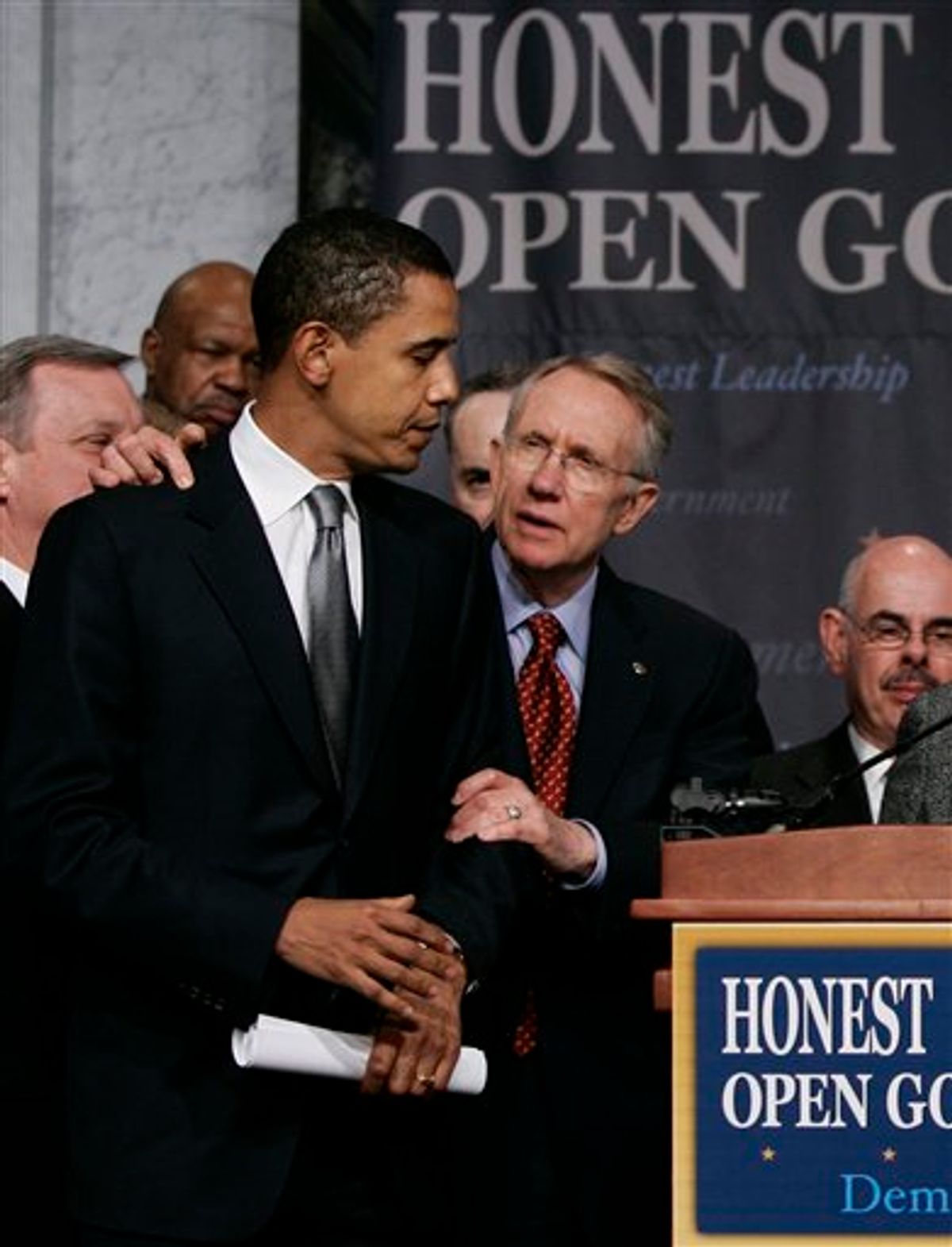 FILE - In this Jan. 18, 2006, file photo Senate Democratic Leader Harry Reid of Nev., center, joined by Sen. Barack Obama, D-Ill., left, prepares to outline the Democrat agenda for reform in the wake of the scandal involving former lobbyist Jack Abramoff, at the Library of Congress in Washington.  Reid apologized Saturday, Jan. 9, 2010, to President Barack Obama  for comments he made about Obama's race during the 2008 presidential bid, which are quoted in a yet-to-be-released book about the campaign titled "Game Change". (AP Photo/J. Scott Applewhite, File)  (AP)