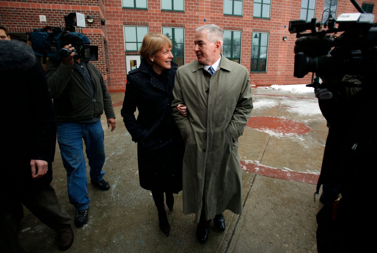 Democratic candidate for the U.S. Senate Martha Coakley (L) and her husband Thomas walk away from the polling station after casting their votes in the special election to fill the Senate seat of the late Edward Kennedy in Medford, Massachusetts January 19, 2010.  REUTERS/Brian Snyder (UNITED STATES - Tags: POLITICS ELECTIONS) (Reuters)