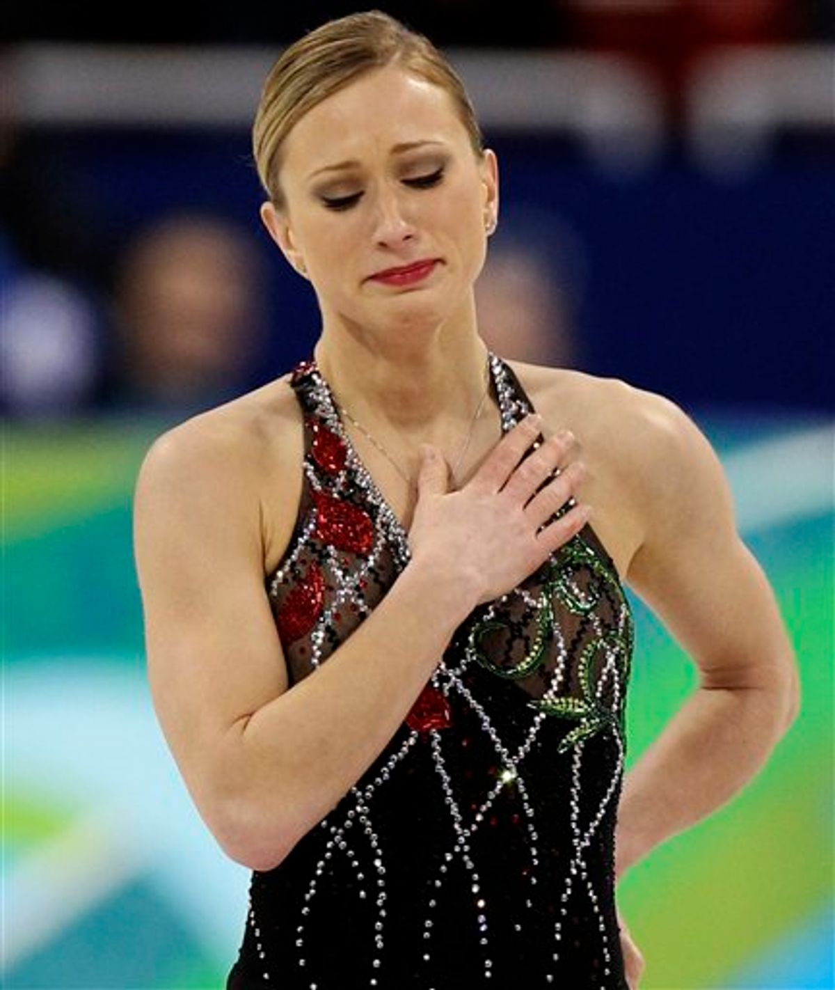 Canada's Joannie Rochette reacts after performing her short program during the women's figure skating competition at the Vancouver 2010 Olympics in Vancouver, British Columbia, Tuesday, Feb. 23, 2010. (AP Photo/Mark Baker) (AP)