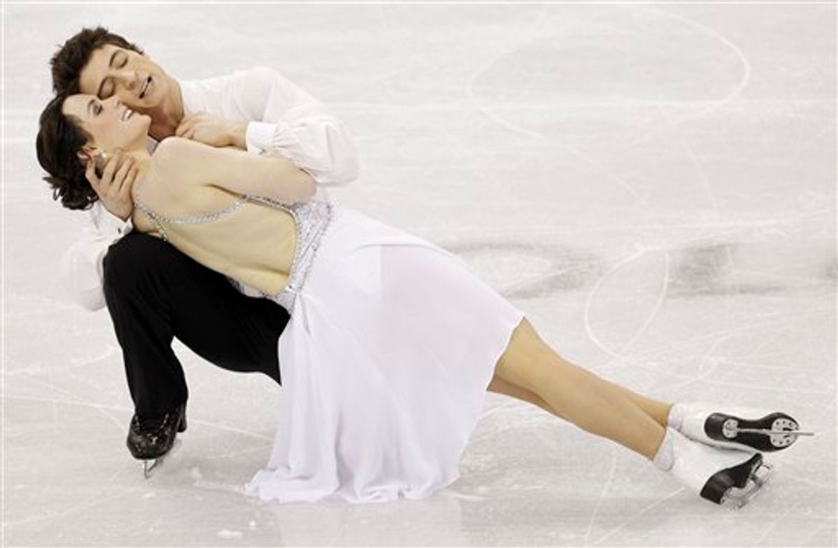 Canada's Tessa Virtue and Scott Moir perform their free dance during the ice dance figure skating competition at the Vancouver 2010 Olympics in Vancouver, British Columbia, Monday, Feb. 22, 2010. (AP Photo/David J. Phillip) (AP)
