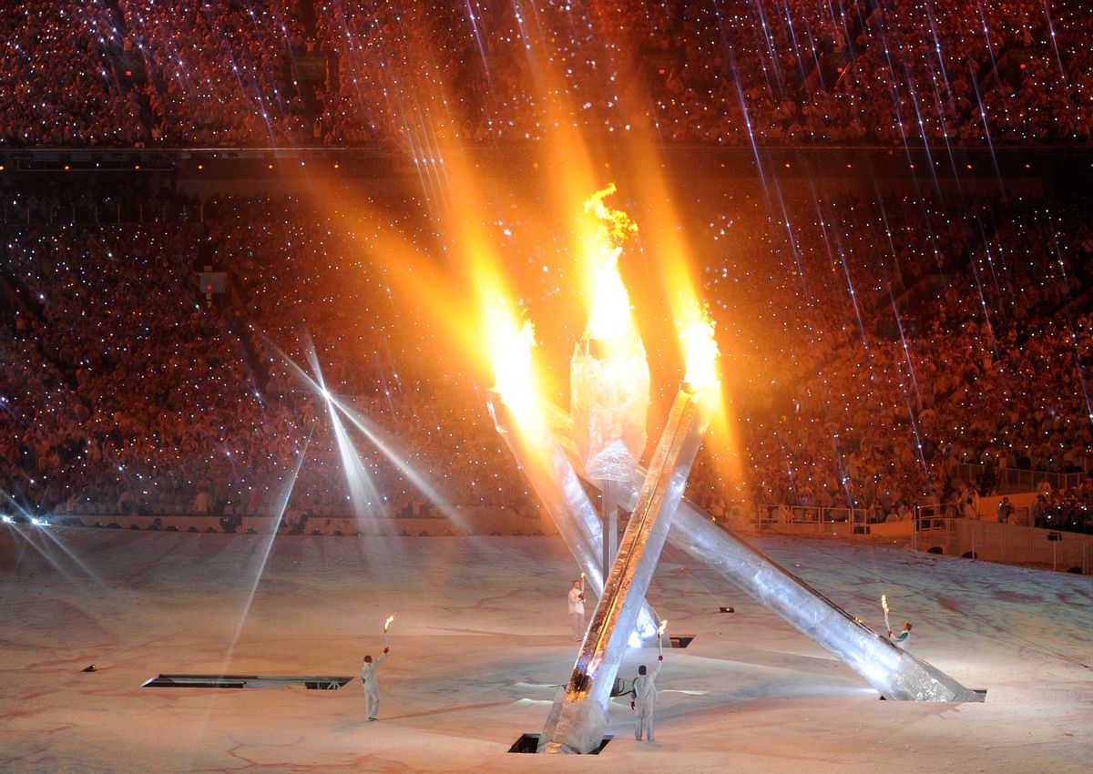 The Olympic flame burns during the opening ceremony of the Vancouver 2010 Winter Olympics, February 12, 2010.     REUTERS/Dylan Martinez (CANADA)  (Reuters)