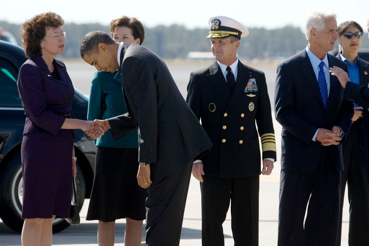 President Barack Obama bows to Tampa Mayor Pam Iorio at MacDill Air Force Base on Thursday, Jan. 28, 2010 in Tampa, Fla. (AP Photo/Edmund Fountain, Pool) (Edmund Fountain)