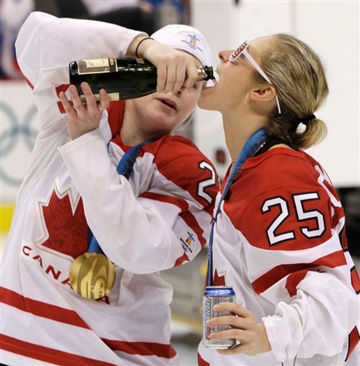 Canada Haley Irwin, left, and Tessa Bonhomme, right, celebrate after Canada beat USA 2-0 to win the women's gold medal ice hockey game at the Vancouver 2010 Olympics in Vancouver, British Columbia, Thursday, Feb. 25, 2010. (AP Photo/Chris O'Meara) (AP)