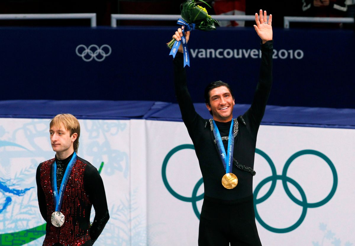 Gold medallist Evan Lysacek (R) of the U.S. waves as he stands next to silver medallist Yevgeny Plushenko of Russia during the medal ceremony after the men's free skating figure skating competition at the Vancouver 2010 Winter Olympics February 18, 2010. Russian Prime Minister Vladimir Putin climbed into the controversy surrounding Plushenko's surprise defeat in the Olympics figure skating by claiming on Friday that he should have been awarded gold. Picture taken February 18, 2010.    REUTERS/David Gray (CANADA)  (Reuters)