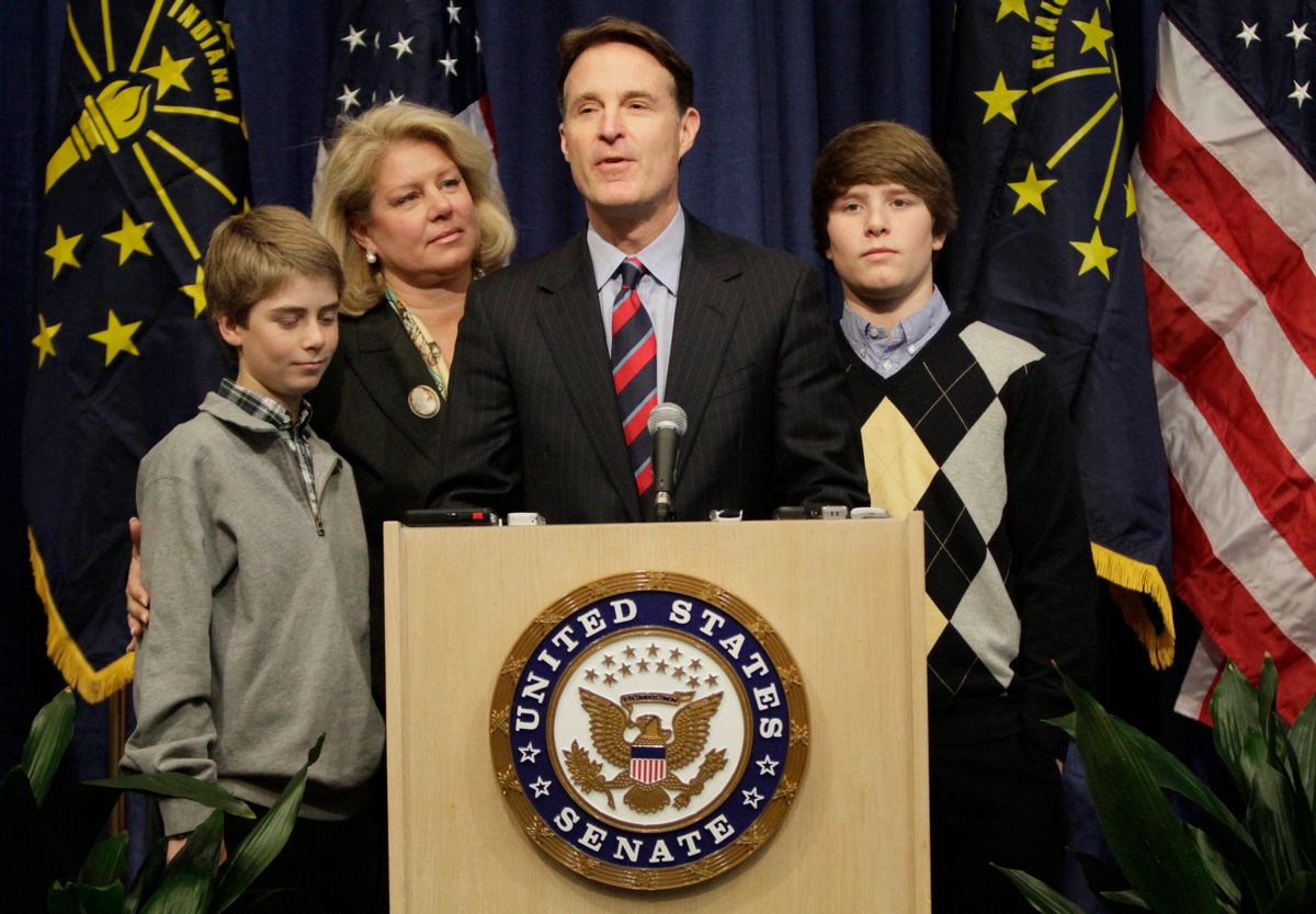 Sen. Evan Bayh, D-Ind., center, speaks while flanked by his sons Nick, left, and Beau, right and wife Susan at a news conference announcing he will not seek re-election in Indianapolis, Monday, Feb. 15, 2010. Bayh is serving his second six-year term in the Senate, and is a centrist Democrat from a Republican-leaning state. (AP Photo/AJ Mast) (Aj Mast)