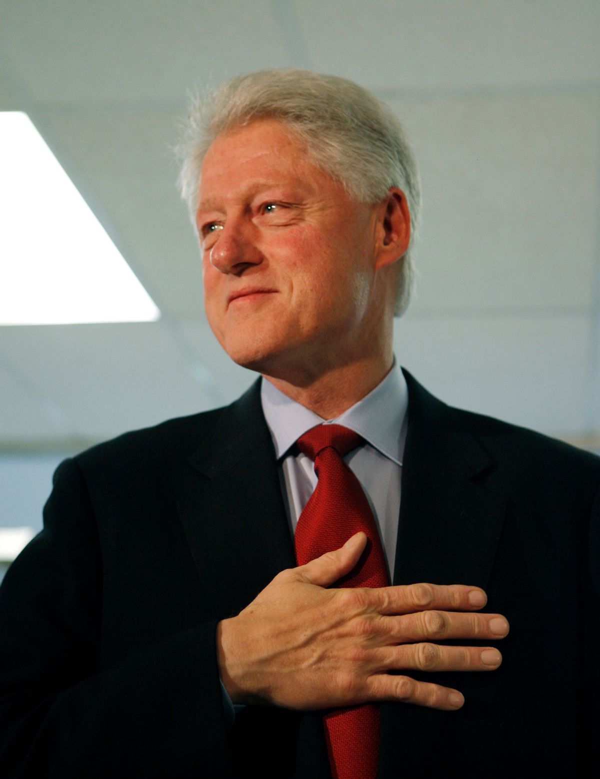 Former U.S. President Bill Clinton holds his hand over his heart as he speaks to reporters after voting for his wife, Democratic presidential candidate U.S. Senator Hillary Clinton (D-NY) in the U.S. presidential primary election at the Douglas Grafflin Elementary School near the Clinton's home in Chappaqua, New York, February 5, 2008.    REUTERS/Mike Segar    (UNITED STATES) US PRESIDENTIAL ELECTION CAMPAIGN 2008      (Â© Mike Segar / Reuters)