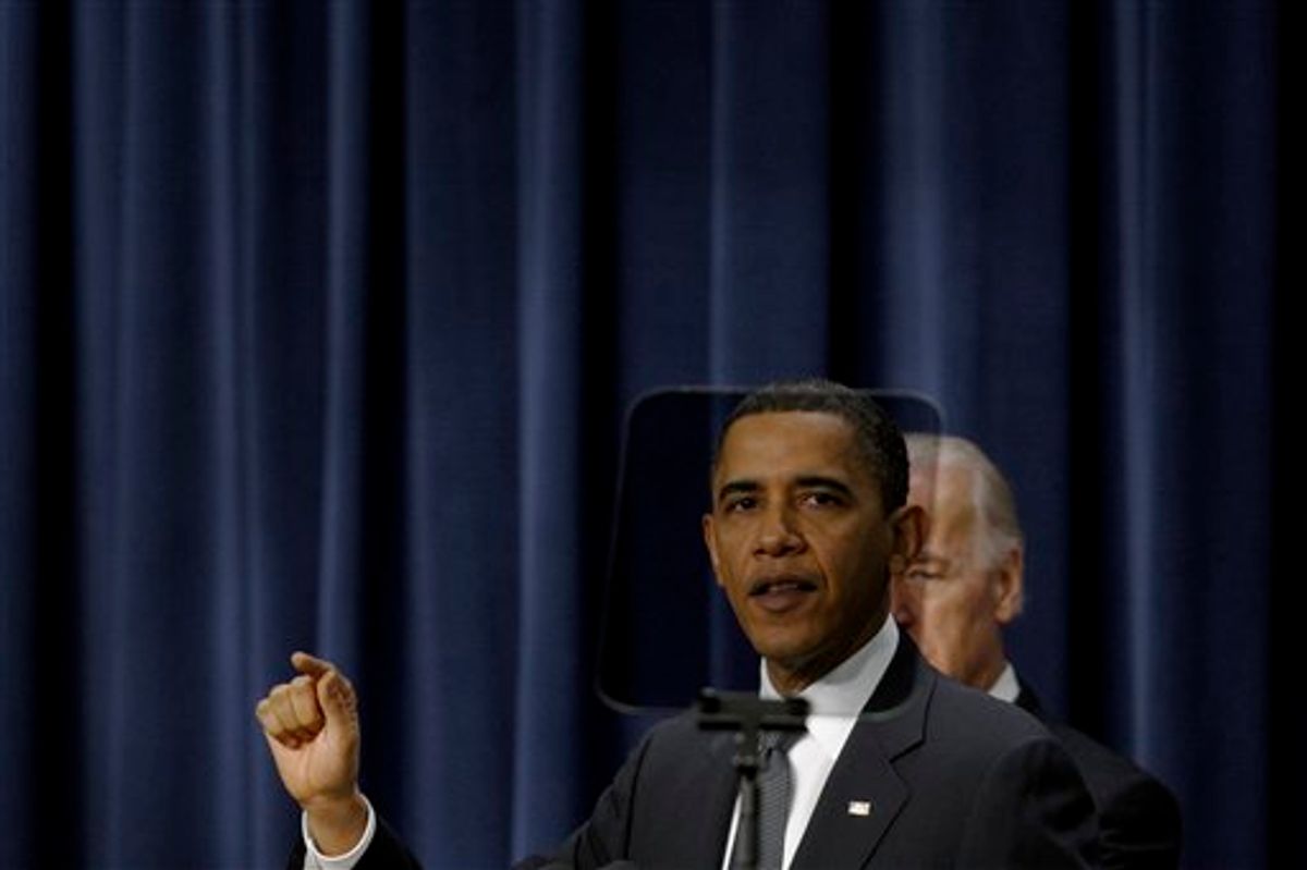 President Barack Obama, accompanied by Vice President Joe Biden, is seen through a teleprompter as he delivers remarks on the economy on the one year anniversary of the signing of the Recovery Act, Wednesday, Feb. 17, 2010, in the South Court Auditorium in the Old Executive Office Building on the White House campus in Washington. (AP Photo/Pablo Martinez Monsivais) (AP)