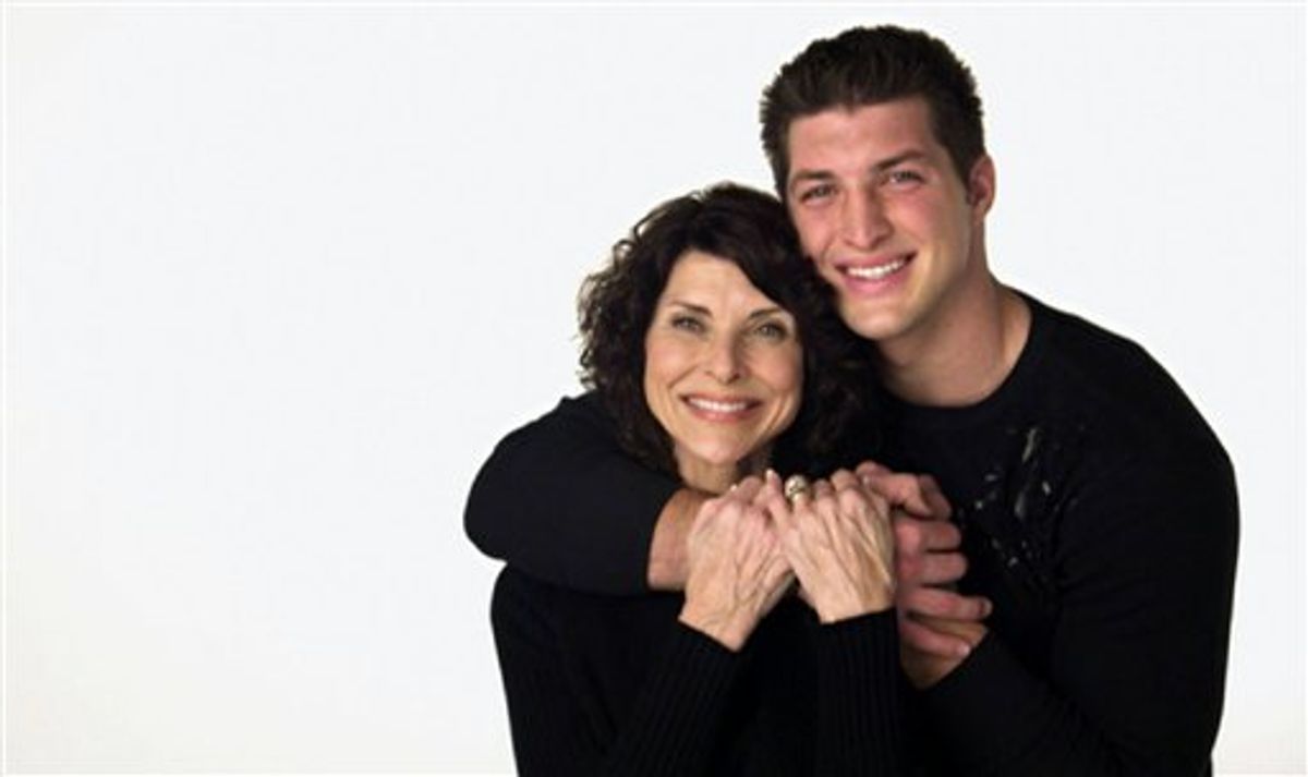 In this image courtesy of Focus on the Family, Heisman Trophy winner Tim Tebow hugs his mom Pam Tebow in a still photo taken from an advertisement to air during the Super Bowl. The commercial, expected to contain an antiabortion message, is the first such advocacy ad to appear in television's most-watched broadcast. (AP Photo/Focus on the Family) NO SALES (AP)