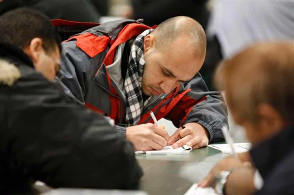 In this photo made Sunday, Jan. 23, 2010, job applicants fill out forms at a job fair in Santa Clara, Calif. The number of new claims for unemployment benefits fell less than expected last week, fresh evidence the job market remains a weak spot in the economic recovery.(AP Photo/Paul Sakuma)   (AP)