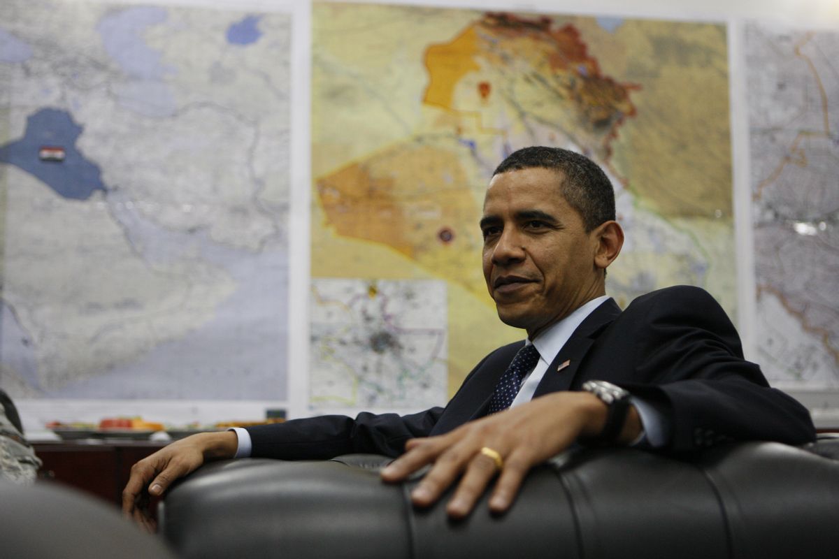 FILE - In this April 7, 2009, file photo, maps of Iraq can be seen on the wall as President Barack Obama meets with Gen. Ray Odierno at Camp Victory in Baghdad, Iraq. (AP Photo/Charles Dharapak, FILE) (Associated Press)