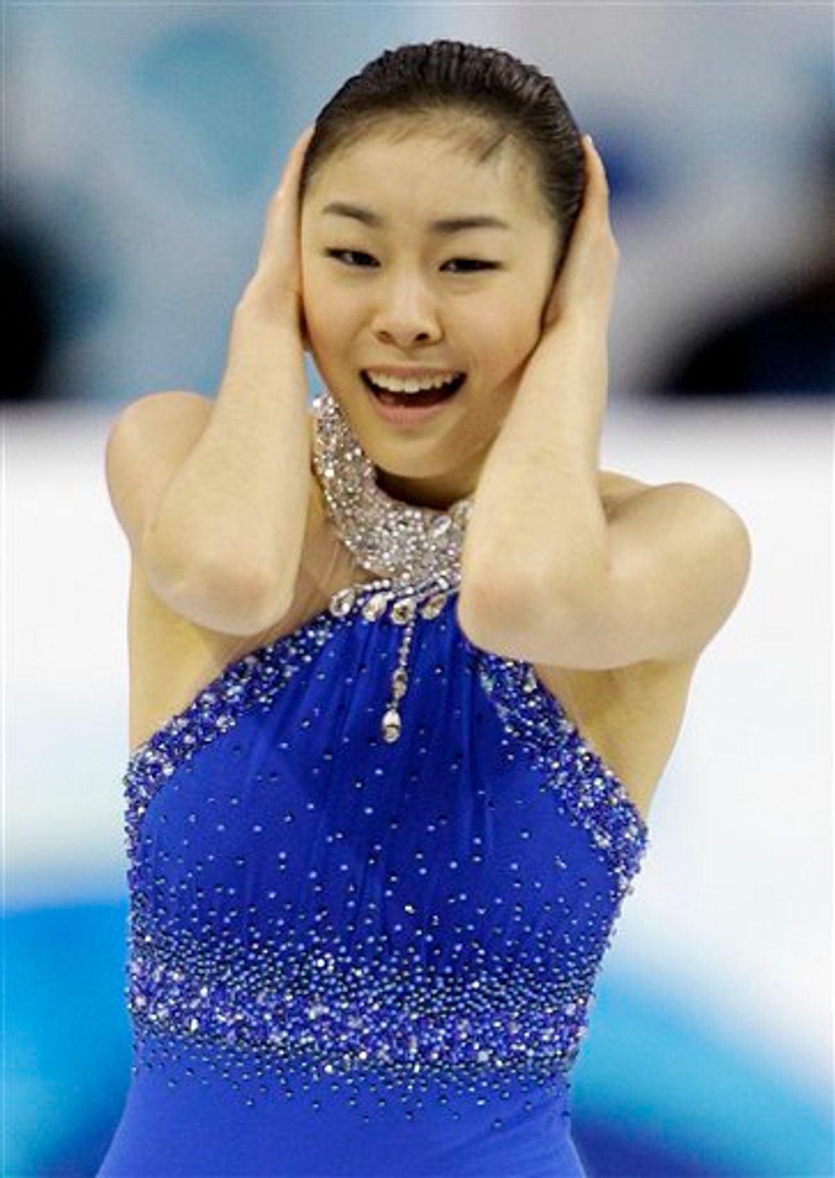 South Korea's Kim Yu-Na reacts after performing her free program during the women's figure skating competition at the Vancouver 2010 Olympics in Vancouver, British Columbia, Thursday, Feb. 25, 2010. (AP Photo/David J. Phillip) (AP)