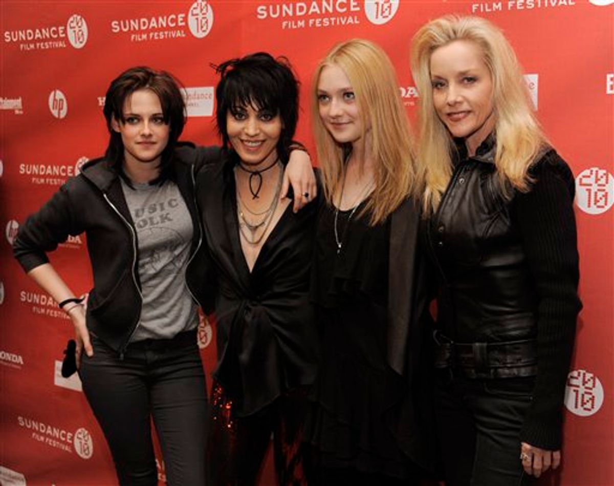 From left, Kristen Stewart, Joan Jett, Dakota Fanning and Cherie Currie pose together at the premiere of the film "The Runaways" at the Sundance Film Festival in Park City, Utah, Sunday, Jan. 24, 2010. Stewart plays Jett and Fanning plays Currie in the film, which chronicles the story of the rock band The Runaways. (AP Photo/Chris Pizzello)         (AP)
