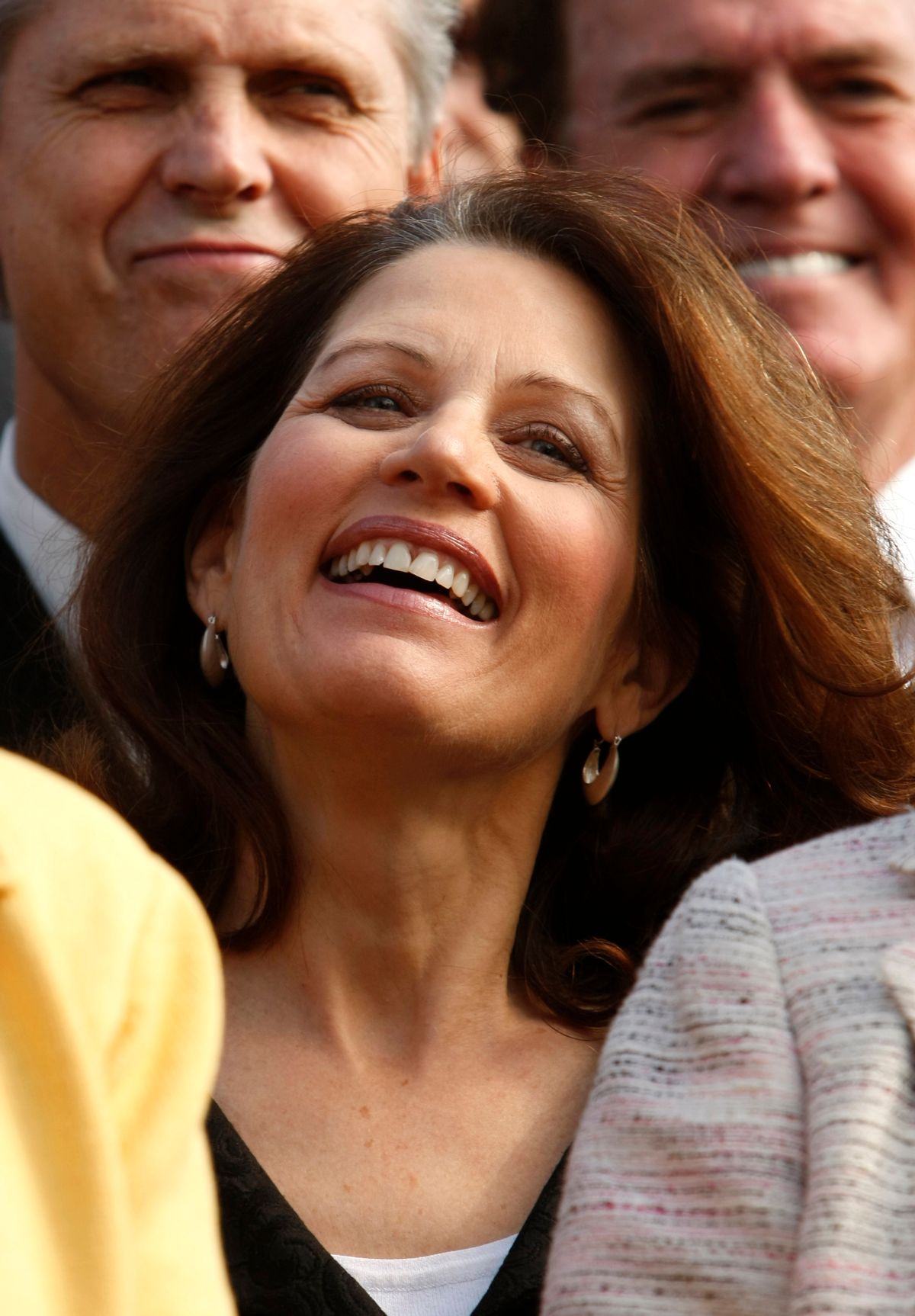 Minnesota Republican Representative Michele Bachmann smiles at a "House Call" rally against proposed healthcare legislation at the Capitol in Washington November 5, 2009.    REUTERS/Kevin Lamarque   (UNITED STATES POLITICS HEALTH) (Reuters)