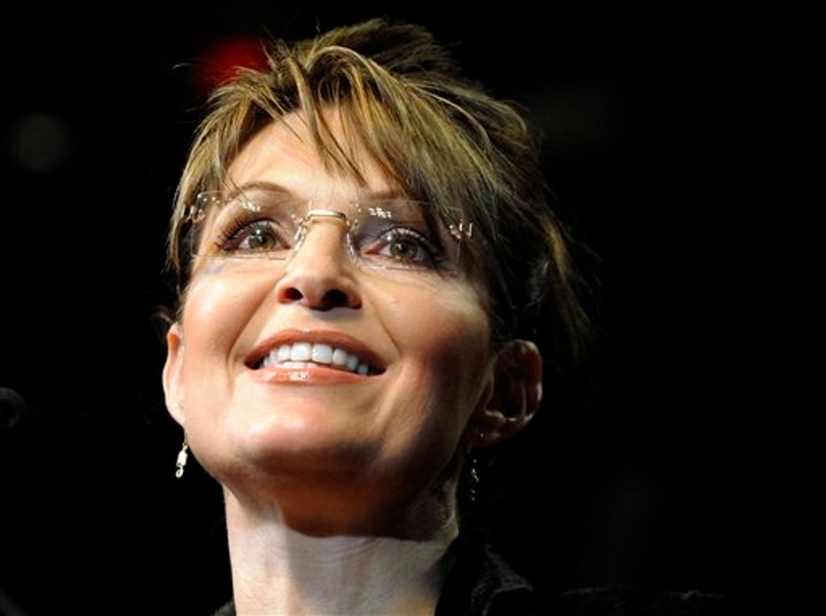FILE - In this Feb. 7, 2010 file photo, former Alaska Gov. Sarah Palin speaks to the crowd at a campaign rally for Texas Gov. Rick Perry in Cypress, Texas. (AP Photo/Pat Sullivan) (AP)