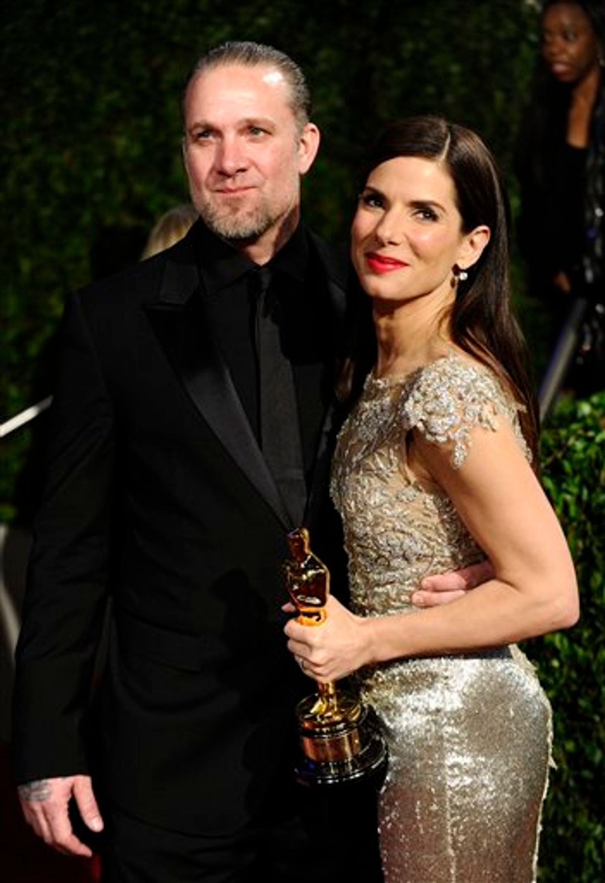 FILE - Sandra Bullock and Jesse James arrive at the Vanity Fair Oscar party on in this March 7, 2010 file photo taken in West Hollywood, Calif. Sandra Bullock has canceled her appearance at the London premiere of "The Blind Side" scheduled for Tuesday March 23, 2010 almost two weeks after winning a Best Actress Academy Award. In a statement released by Warner Bros UK., the 45-year-old actress says she can't attend the event for "unforeseen personal reasons." (AP Photo/Peter Kramer, File)  (AP)