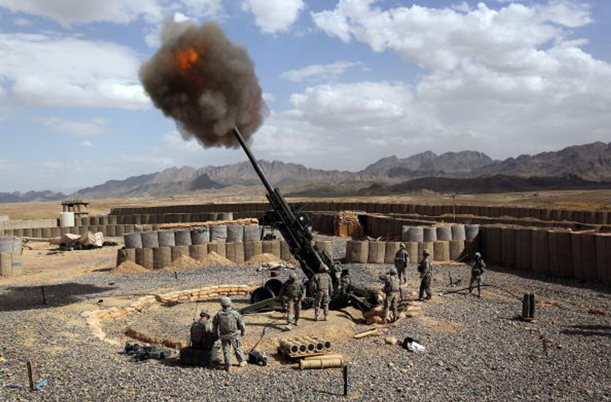 FORWARD OPERATING BASE FRONTENAC, AFGHANISTAN - MARCH 05: U.S. Army soldiers from the 3-17 Field Artillery fire a 155mm Howlitzer at a Taliban observation point on March 5, 2010 from Forward Operating Base Frontenac in Kandahar province in southern Afghanistan. The U.S. military is expected to launch a major offensive against Taliban insurgents in Kandahar in upcoming months following its recent operation in Marja, in neighboring Helmand province.  (Photo by John Moore/Getty Images) (John Moore)