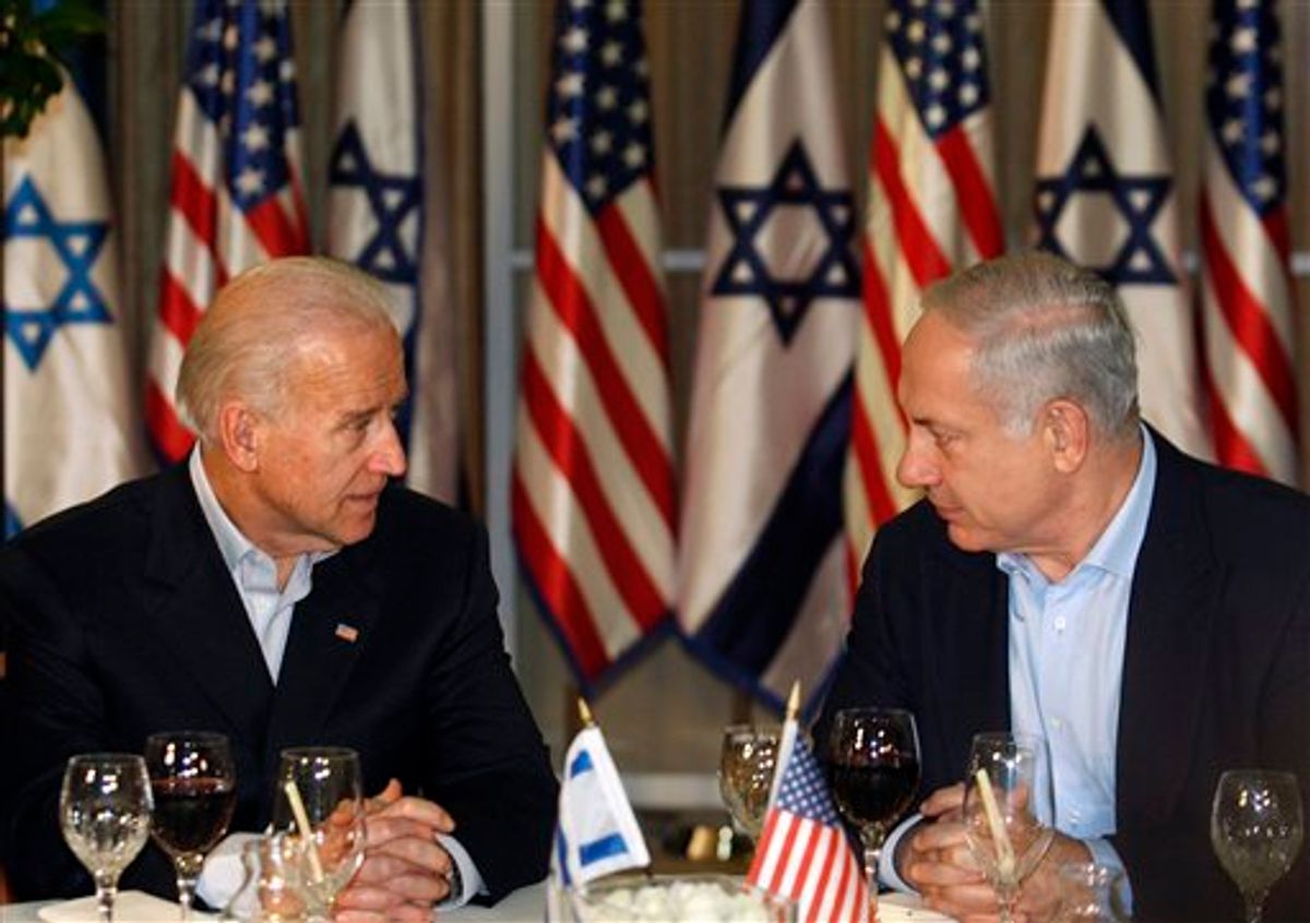U.S. Vice President Joseph Biden, left, and Israeli Prime Minister Benjamin Netanyahu, right, talk before a dinner at the Prime Minister's residence in Jerusalem, Tuesday, March 9, 2010. (AP Photo/Baz Ratner, Pool) (AP)