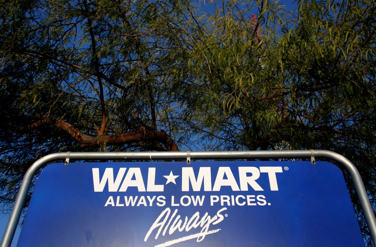 The Wal-Mart logo is seen on a sign in Phoenix, Arizona, February 18, 2010. Wal-Mart Stores Inc, the world's biggest retailer, releases its fourth quarter earnings report on on Thursday.  REUTERS/Joshua Lott (UNITED STATES - Tags: BUSINESS)  (Reuters)
