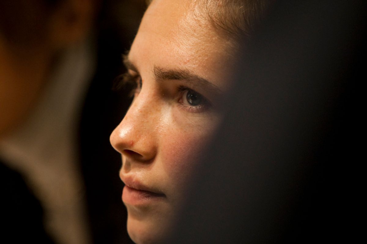 American university student Amanda Knox looks on during a murder trial session in Perugia December 3, 2009. Defendants Knox and her Italian ex-boyfriend Raffaele Sollecito are on trial for the 2007 murder of British student Meredith Kercher. REUTERS/Max Rossi (ITALY CRIME LAW)   BEST QUALITY AVAILABLE     (Â© Max Rossi / Reuters)