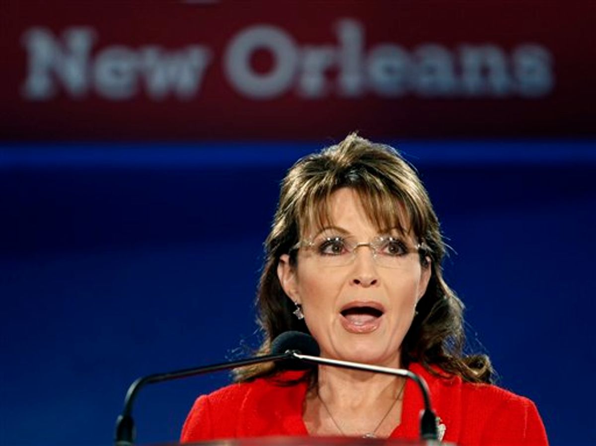 Sarah Palin speaks at the Southern  Republican Leadership Conference in New Orleans, Friday, April 9, 2010. Former vice presidential candidate Sarah Palin says her "Don't retreat _ reload" slogan is a call for political activism, not violence.  (AP Photo/Gerald Herbert) (AP)