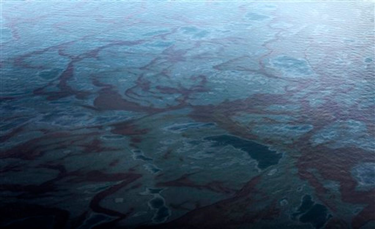 In this aerial photo taken in the Gulf of Mexico off Louisiana's tip, oil is seen near the site last week's collapse and spill of the Deepwater Horizon oil rig Wednesday, April 28, 2010. (AP Photo/Gerald Herbert) (AP)