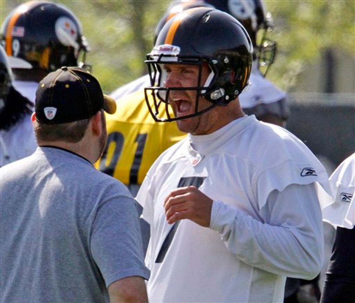 Pittsburgh Steelers quarterback Ben Roethlisberger (7)  tries on his helmet during the NFL team's practice in Pittsburgh Monday, April 19, 2010.  (AP Photo/Gene J. Puskar) (AP)