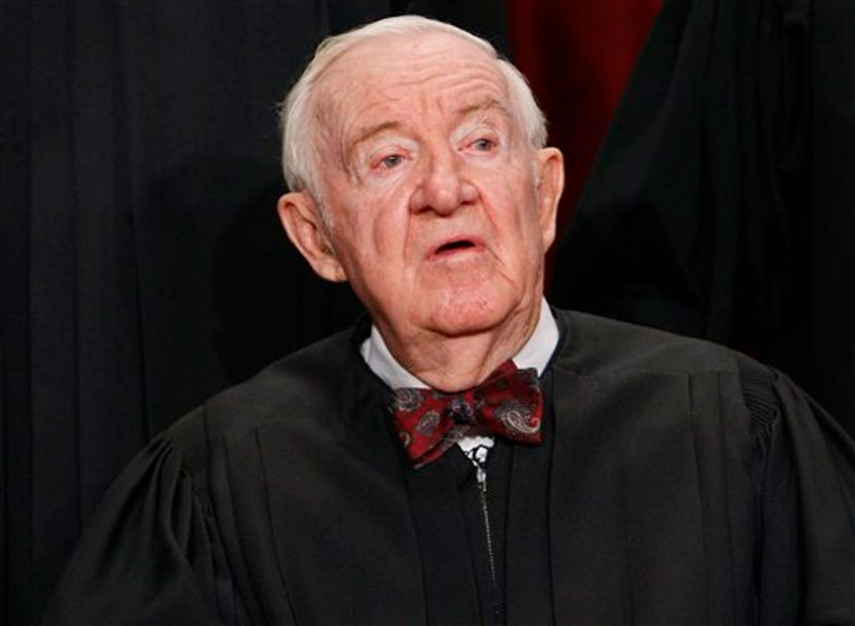 FILE - In this Sept. 29, 2009, file photo Associate Justice John Paul Stevens sits for a new group photograph at the Supreme Court in Washington. Stevens, the oldest justice who turns 90 this April 2010, says he'll decide soon about retiring, for his own peace of mind and to give President Barack Obama and the Senate plenty of time to replace him. (AP Photo/Charles Dharapak, File)  (AP)