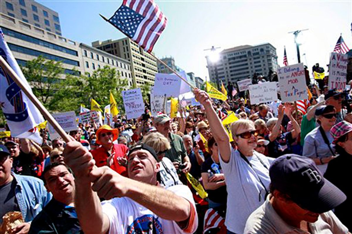 People attend a tea party protest in Washington, Thursday, April 15, 2010. (AP Photo/Jacquelyn Martin) (Jacquelyn Martin)