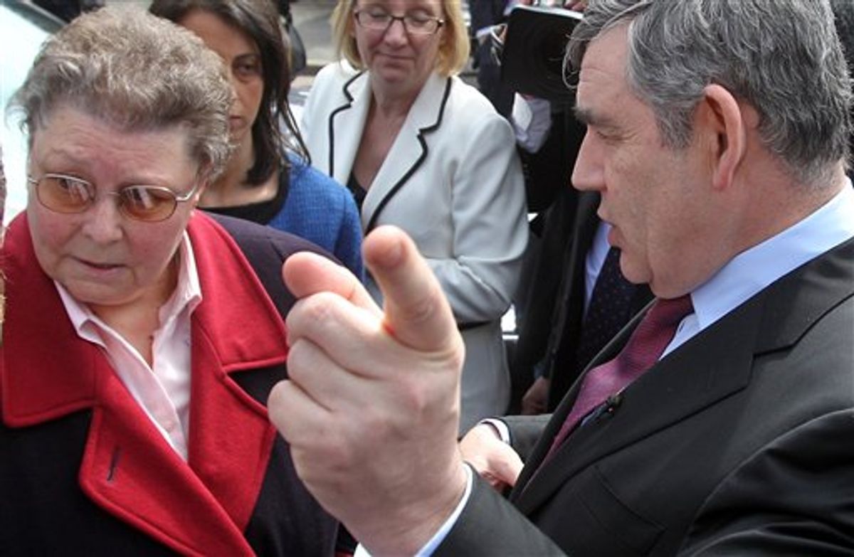 Britain's Prime Minister Gordon Brown, wearing a Sky News microphone, speaks to local resident Gillian Duffy, 65, while campaigning for Britain's May 6 General Election in Rochdale, England, Wednesday April 28, 2010. Brown was caught on microphone describing a voter he had just spoken to - apparently Duffy - as a "bigoted woman". The comments were made as he got into his car, not realising that he had the microphone pinned to his jacket. He told an aide: "That was a disaster - they should never have put me with that woman. Whose idea was that? It's just ridiculous..." Asked what she had said, he replied: "Everything, she was just a bigoted woman."(AP Photo&lt; Lewis Whyld-pa) **UNITED KINGDOM OUT: NO SALES: NO ARCHIVE:** (AP)